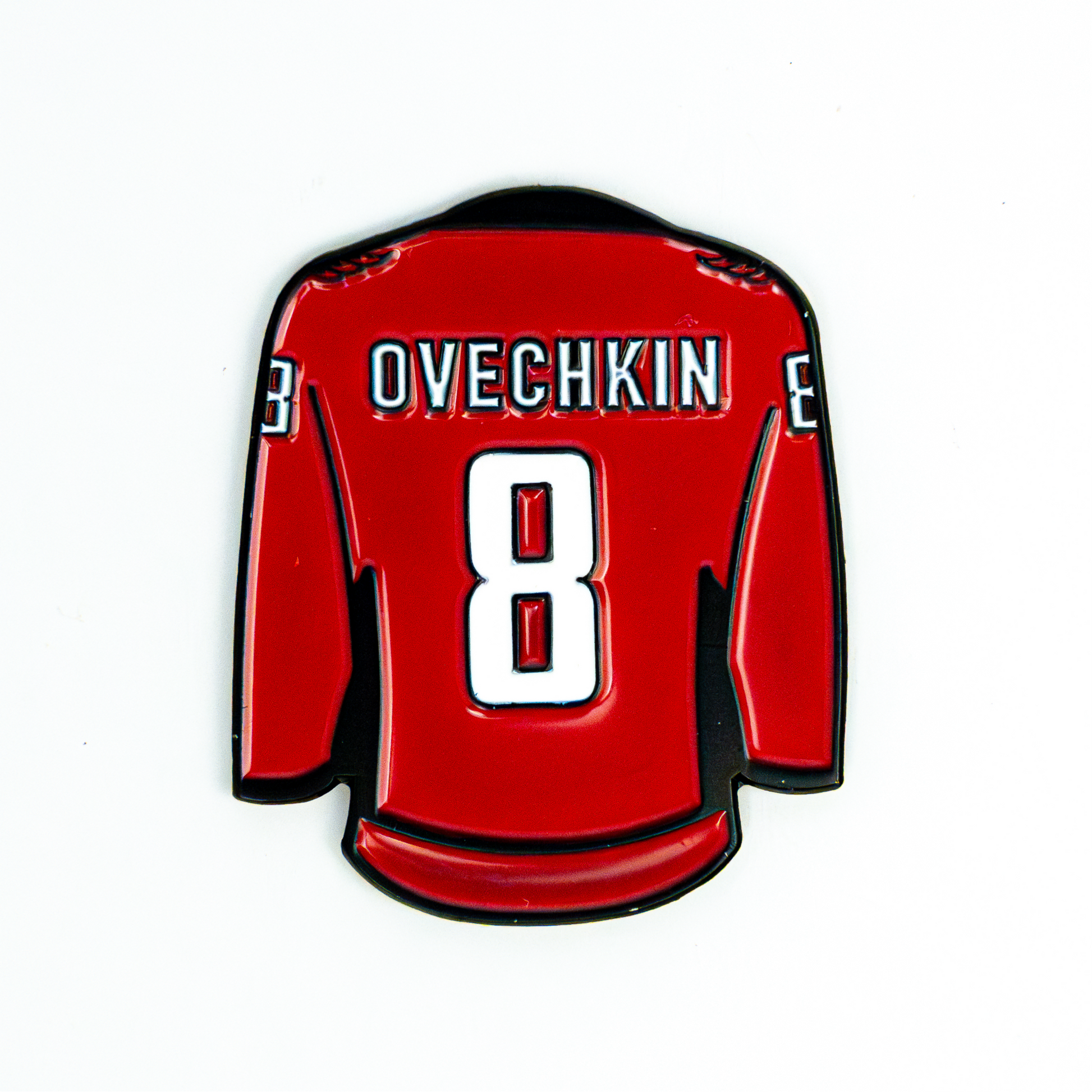 Sandybirds Golf Gear Ovechkin Ball Marker - Premium quality golf ball marker made of zinc alloy, designed in the shape of an Ovechkin jersey. A perfect accessory for golf enthusiasts looking to add a touch of style and precision to their game.