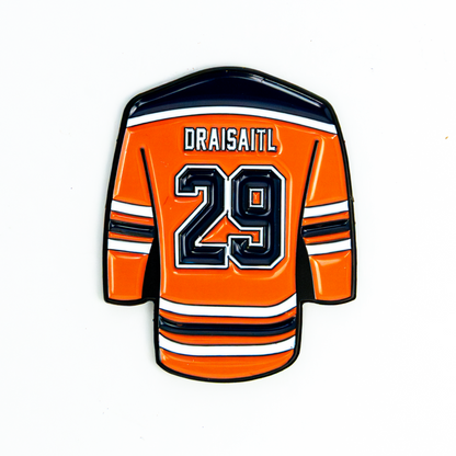 Leon Draisaitl jersey-shaped golf ball marker with design details.