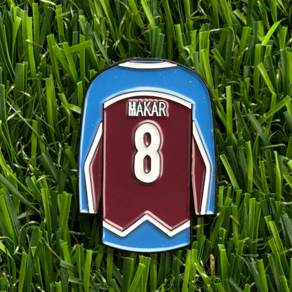 Sandybirds Golf Gear Makar Ball Marker - Premium quality golf ball marker made of zinc alloy, designed in the shape of a Makar jersey. A perfect accessory for golf enthusiasts looking to add a touch of style and precision to their game.