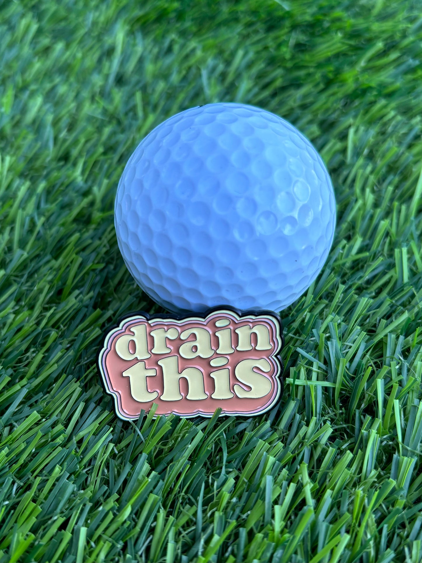 Premium golf ball markers with unique and stylish designs, crafted for durability and enhancing your golf game.