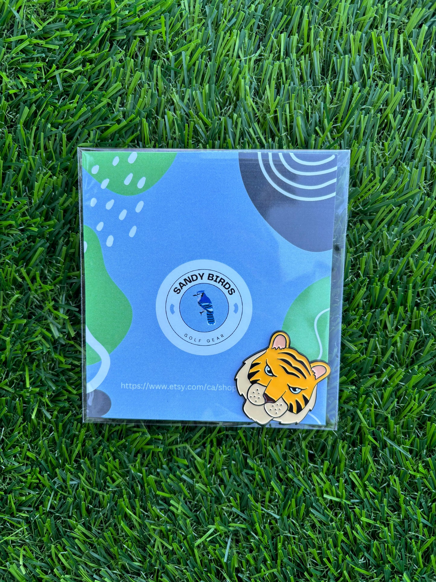 Premium golf ball markers with unique and stylish designs, crafted for durability and enhancing your golf game.