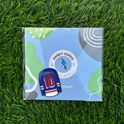 Artemi Panarin custom golf ball marker on Sandy Birds packaging on grass