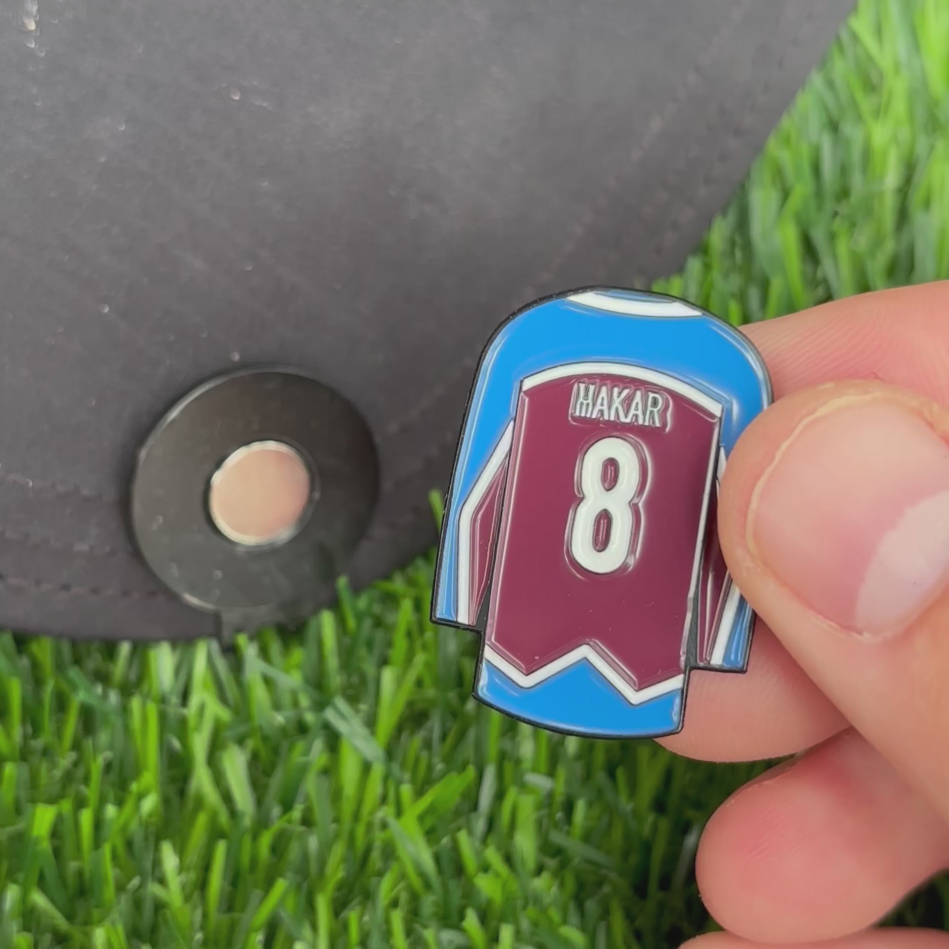 Sandybirds Golf Gear Makar Ball Marker - Premium quality golf ball marker made of zinc alloy, designed in the shape of a Makar jersey. A perfect accessory for golf enthusiasts looking to add a touch of style and precision to their game.