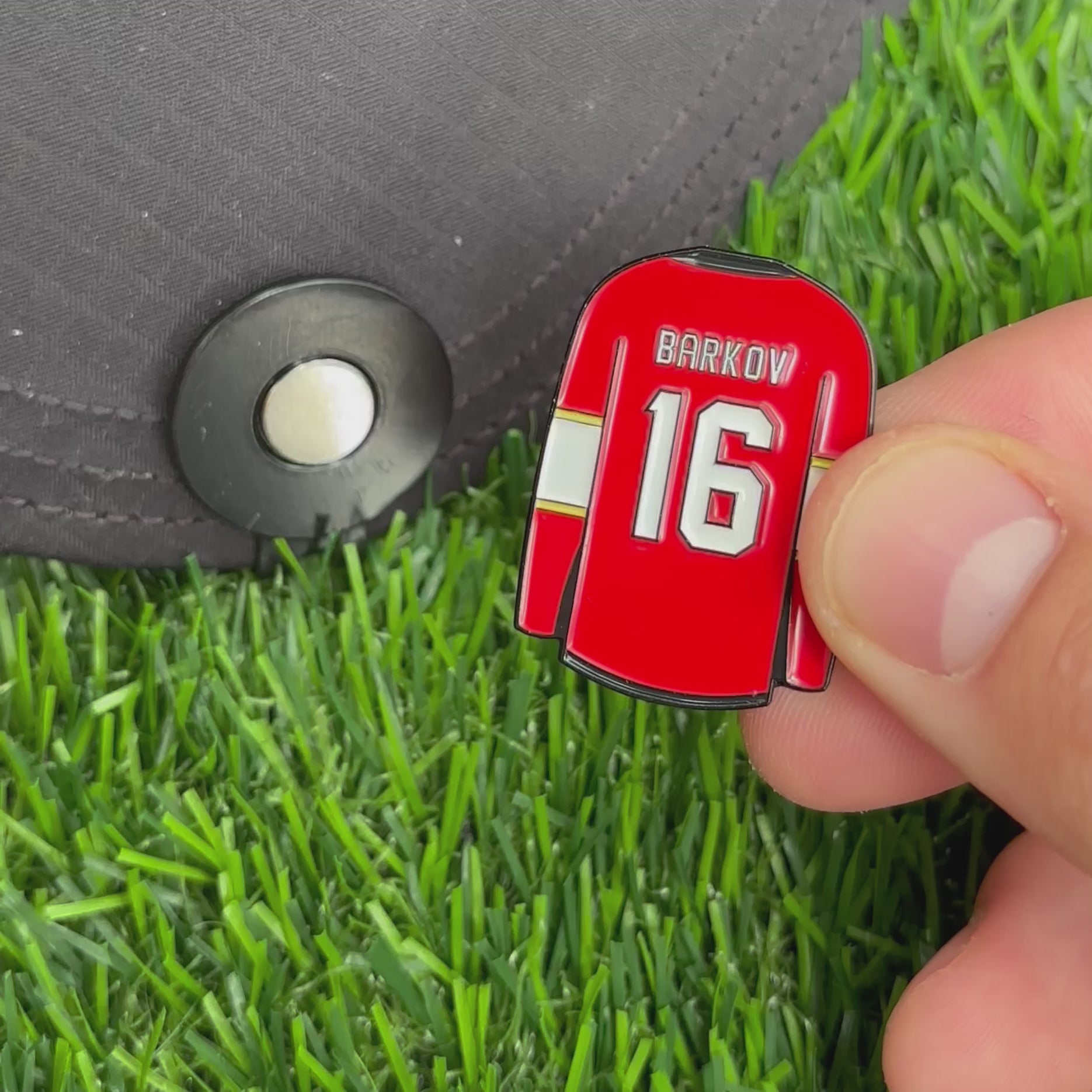 Sandybirds Golf Gear Barkov Ball Marker - Premium quality golf ball marker made of zinc alloy, designed in the shape of a Barkov jersey. A perfect accessory for golf enthusiasts looking to add a touch of style and precision to their game.